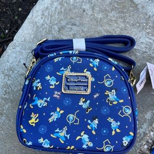 Disneys 50th Anniversary Loungefly pin trading purse exclusive to Disney World.